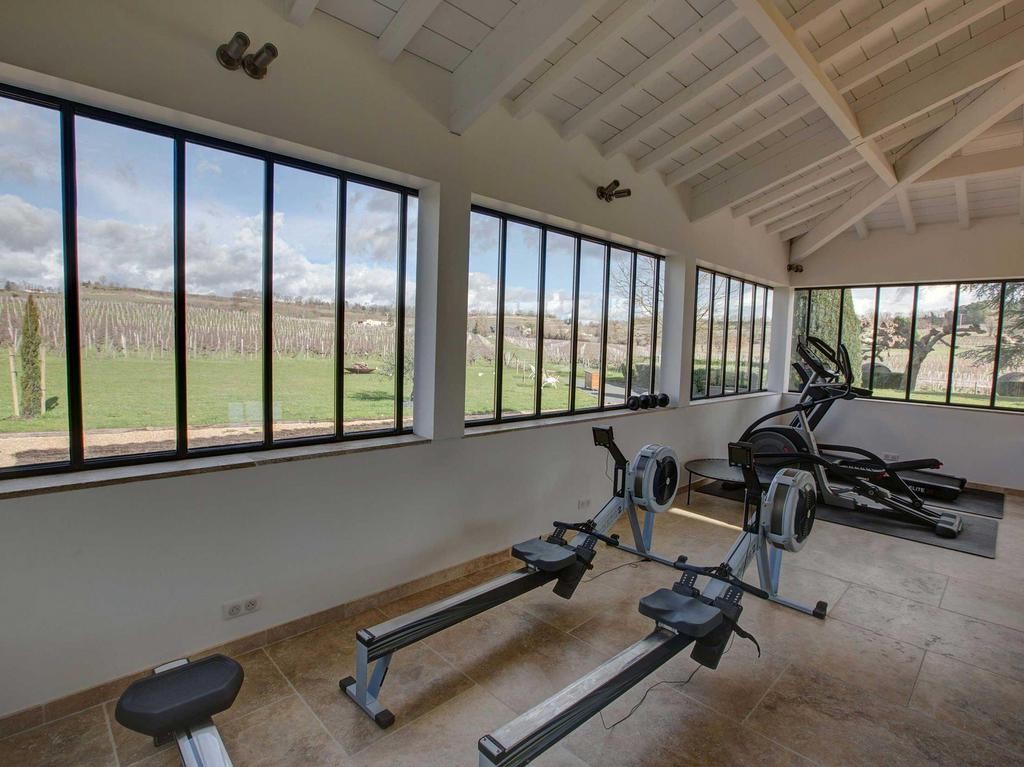 La Salle Fitness & cardio avec vue sur les vignes du Chateau du Palanquey